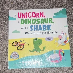 Unicorn, Dinosaur, and Shark Were Riding A Bicycle Kids Book